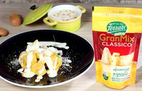 Ravioloni con la zucca su salsa al formaggio