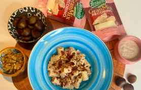Mezze maniche con crema di castagna, noci, GranMix al Pecorino e briciole di speck croccante